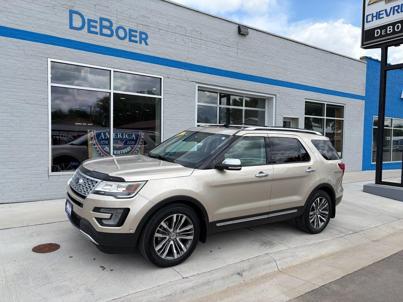2017 Ford Explorer Platinum, Dual Moonroof, Cooled/ Heated/ Massaging Seats, Sony Audio System in Gold — front three-quarter view